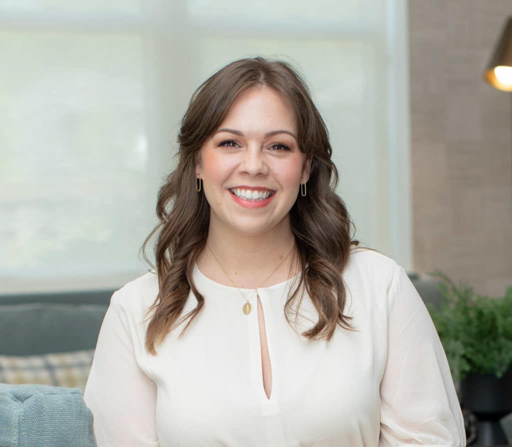 professional shot of woman sitting in chair