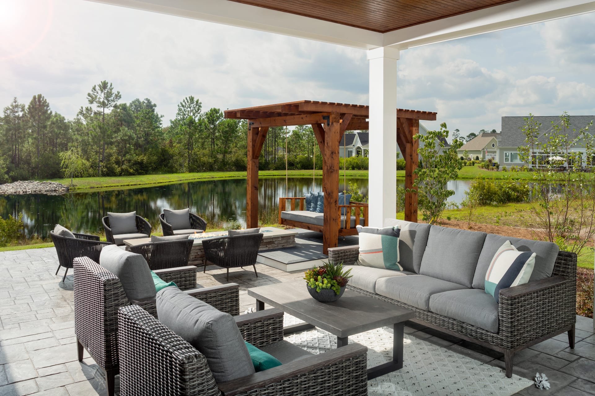 ourdoor living on lake with couches and seating