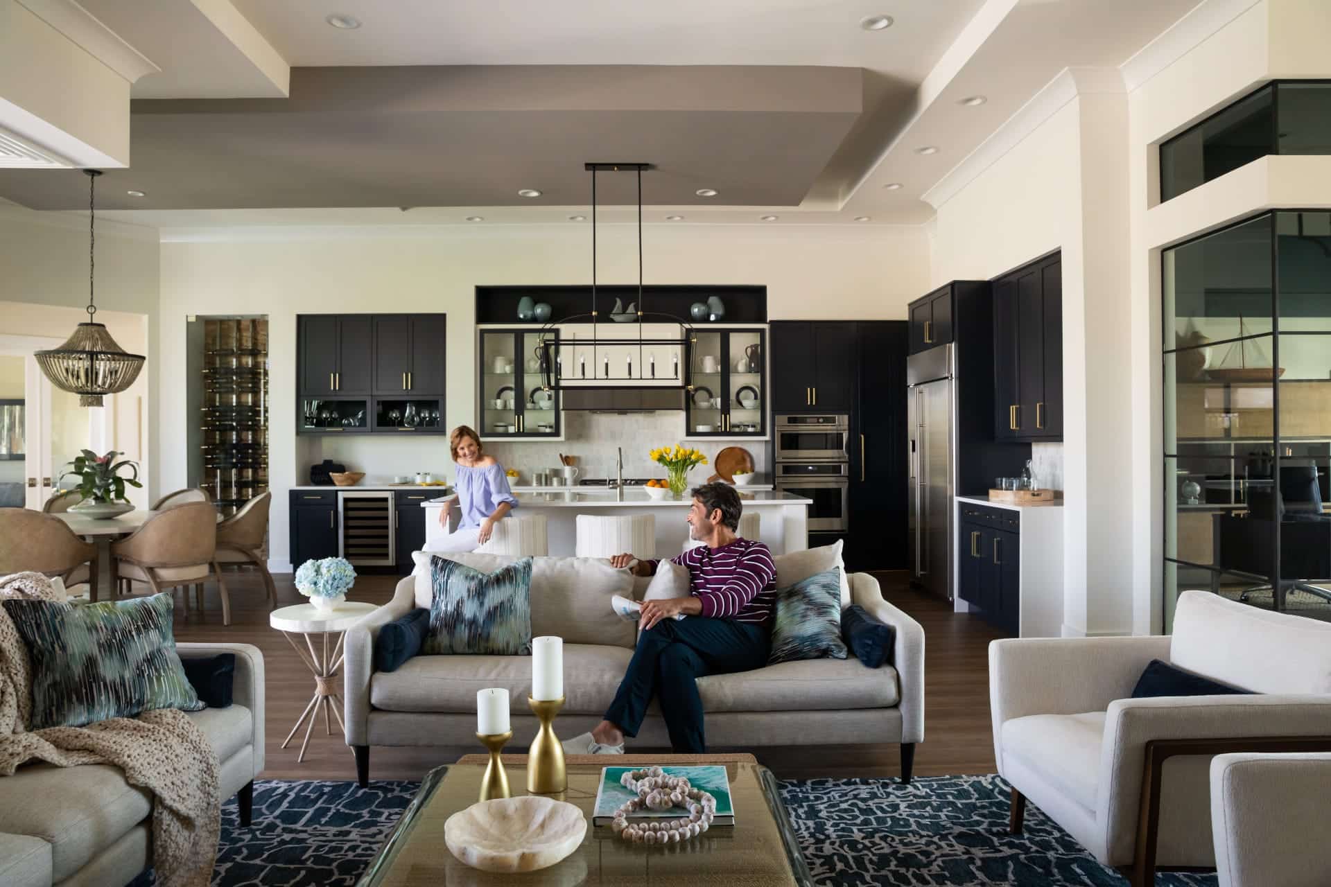 model home indoor living with people on couch