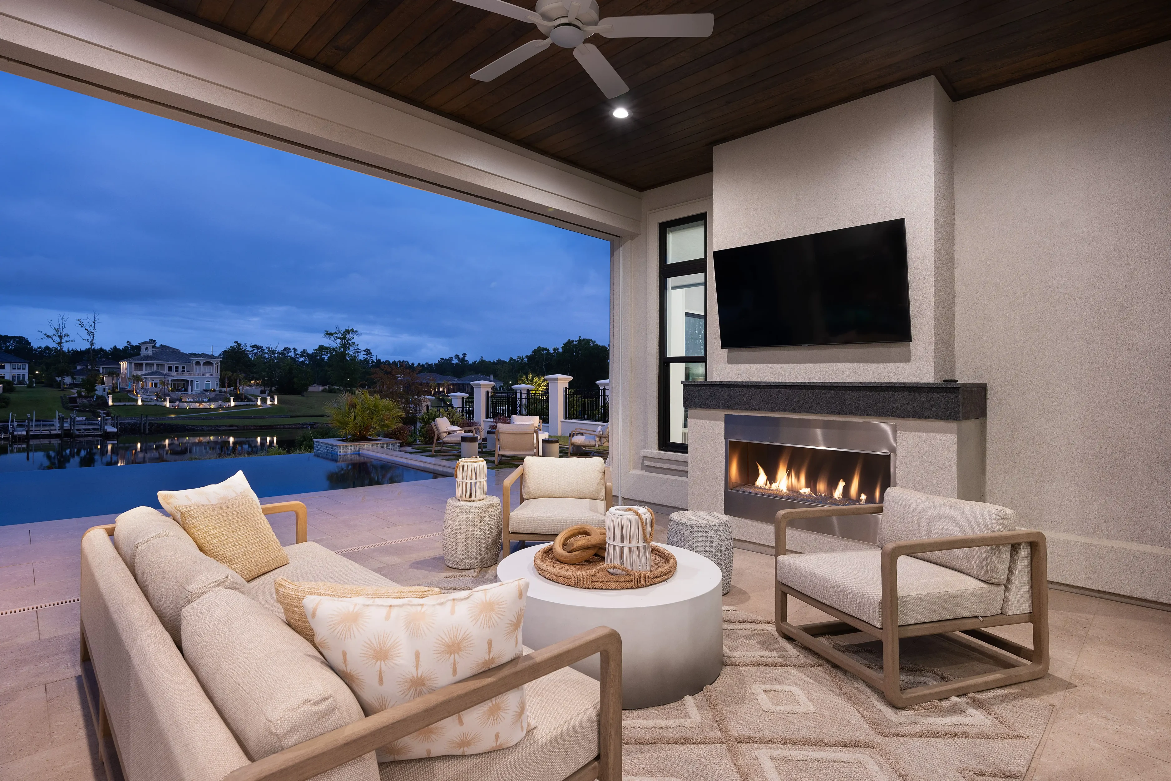 Arezzo Decorated Model Home Outdoor Living and Fireplace by Myrtle Beach, SC Custom Home Builder