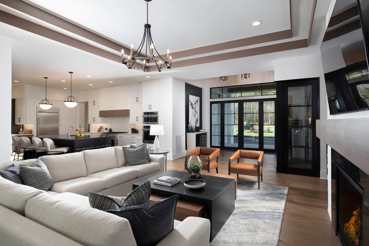 great room couch and seating area next to sliding glass doors