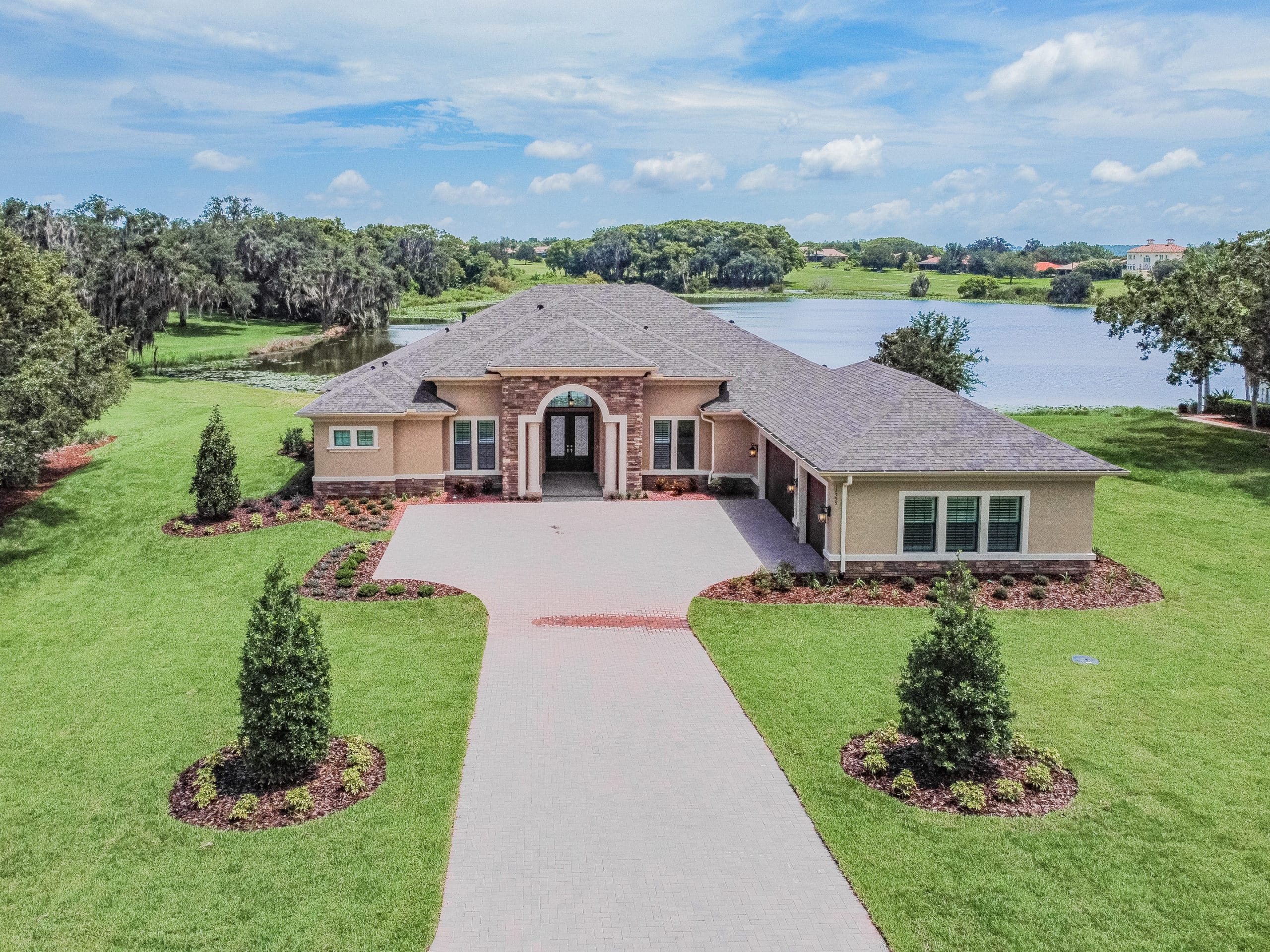 exterior of custom home by lake