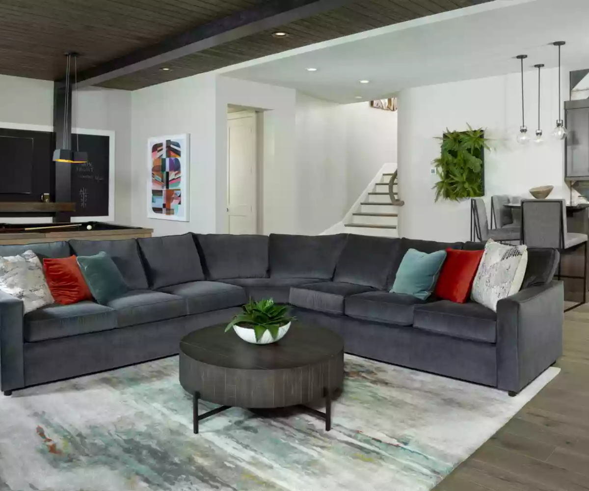 Custom Kennedy home rec room grey sectional in main space