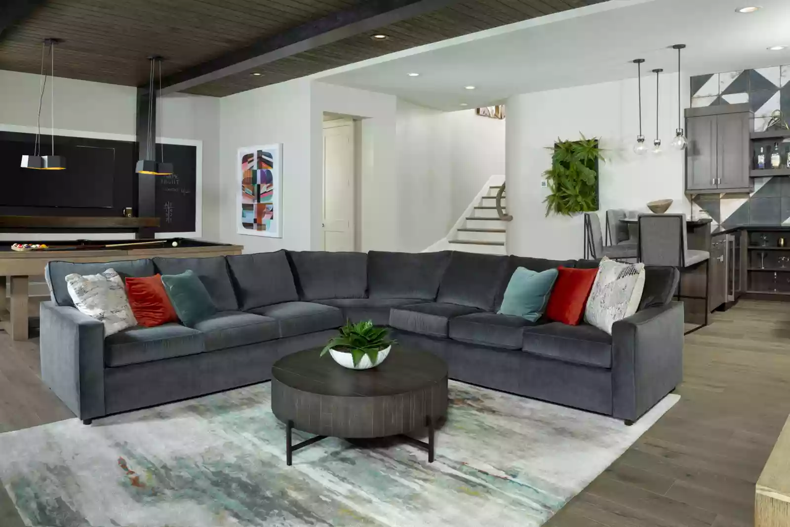 Custom Kennedy home rec room grey sectional in main space