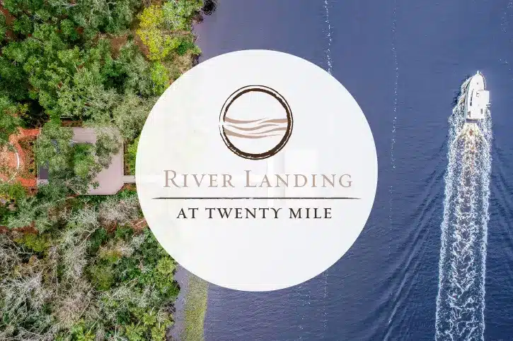 River Landing Logo over drone shot of coastline